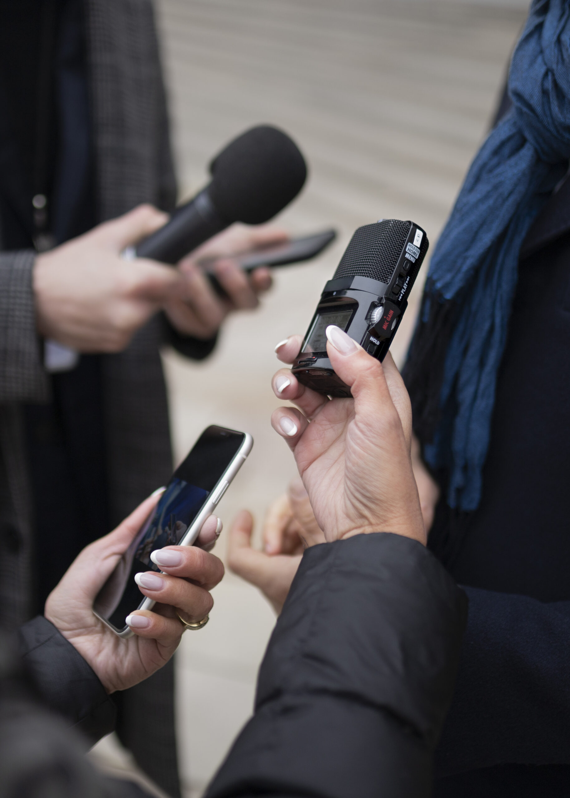 close-up-reporter-taking-interview